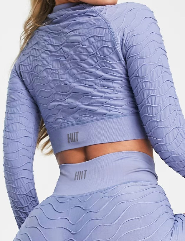 Seamless long sleeve crop top in textured dusky blue