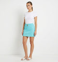 Textured mini skirt with front cut out in turquoise