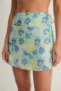 Mesh tie side mini skirt in yellow floral