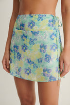 Mesh tie side mini skirt in yellow floral
