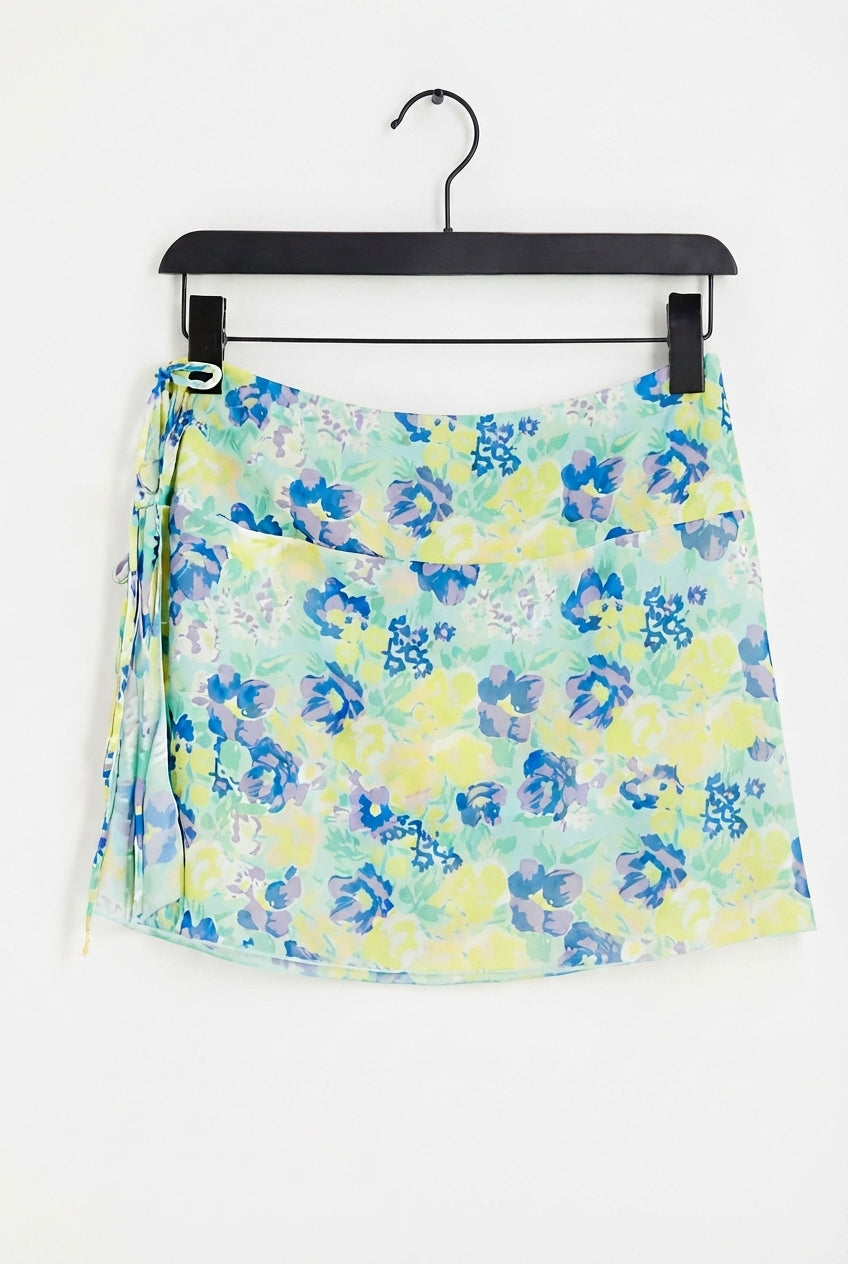 Mesh tie side mini skirt in yellow floral